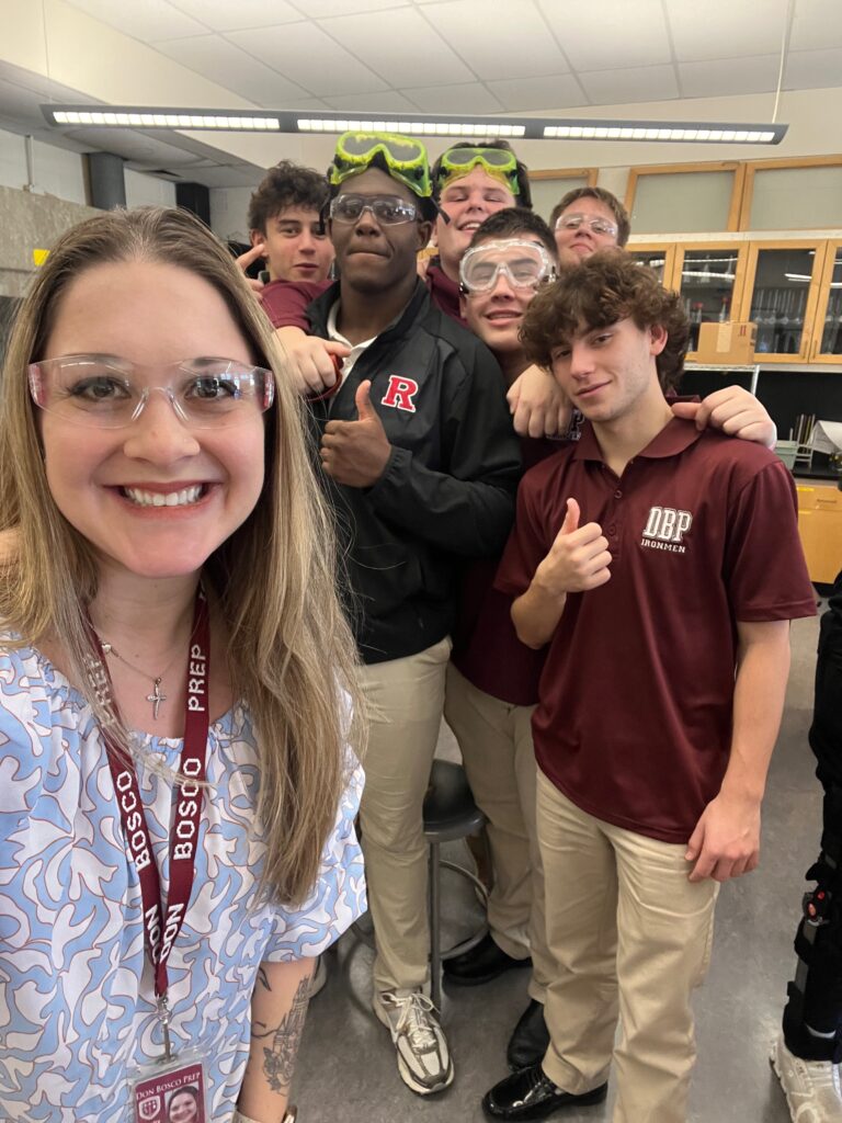 Chemistry teacher with students
